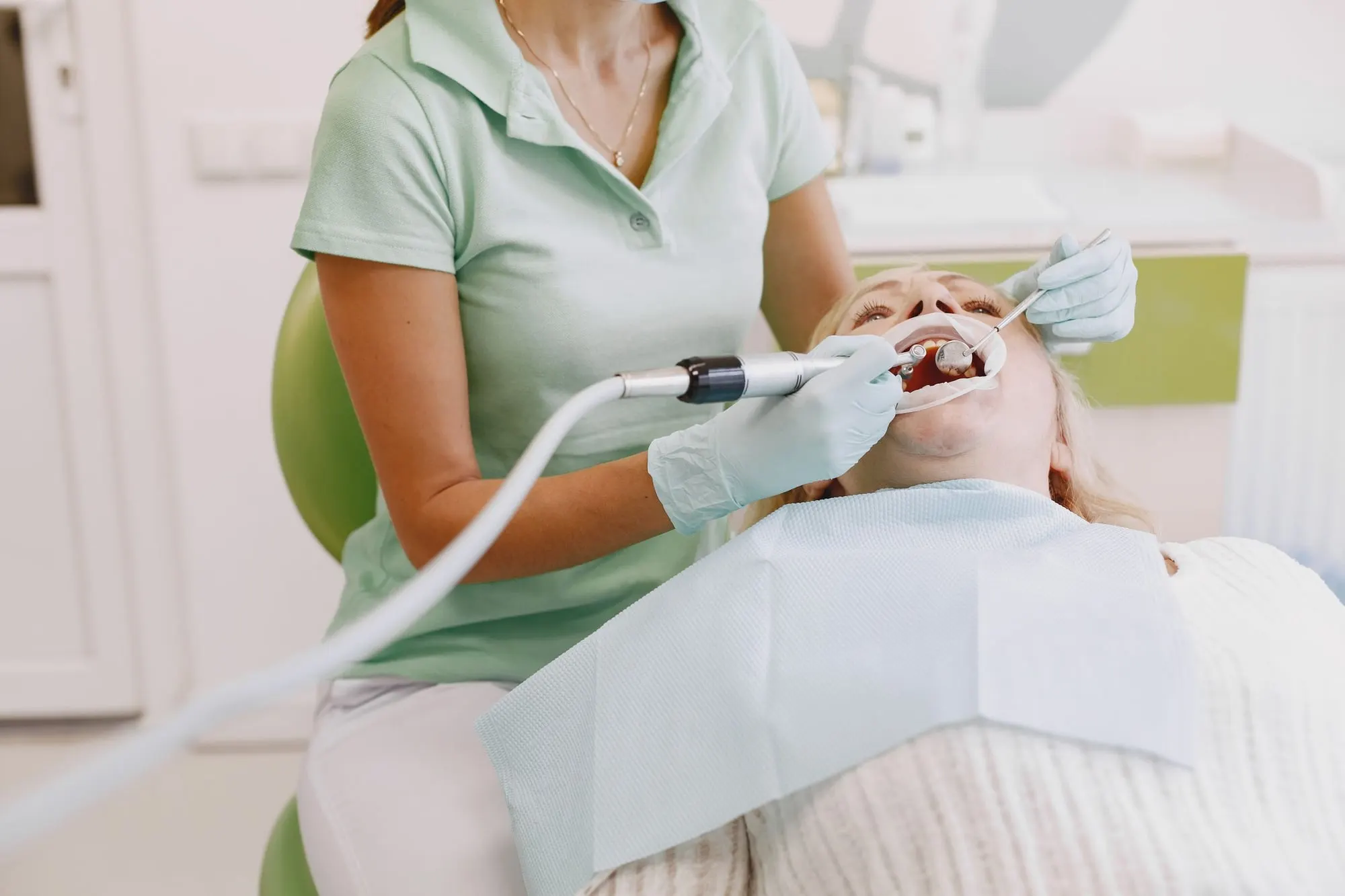 Patient having a professional teeth clean