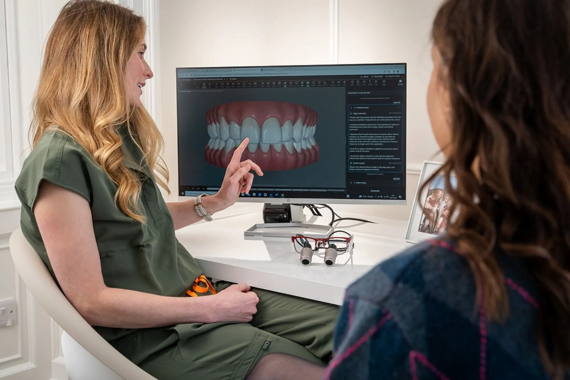 Dentist explaining a treatment plan to a patient