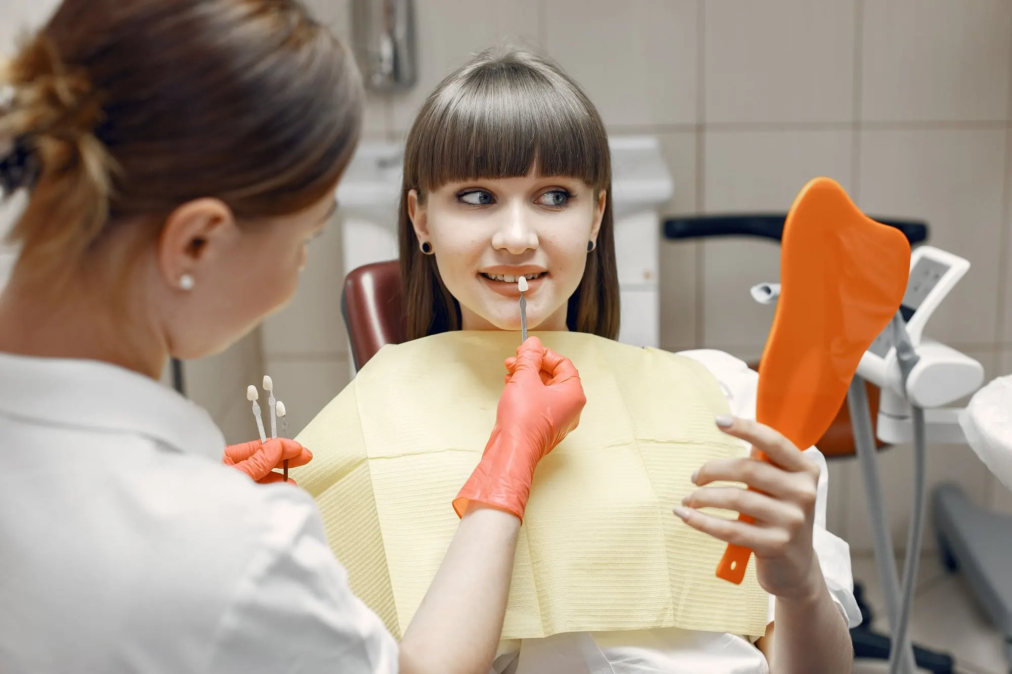 Patient discussing a smile makeover with her dentist